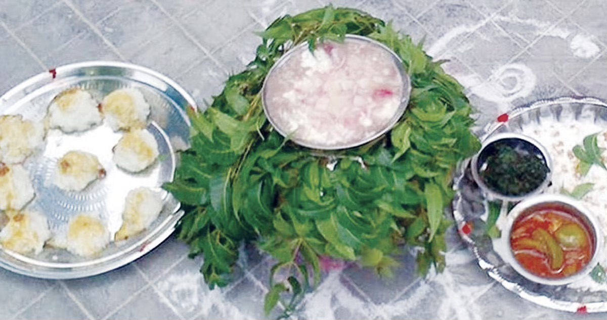 Worshipping the goddess by pouring porridge..!!